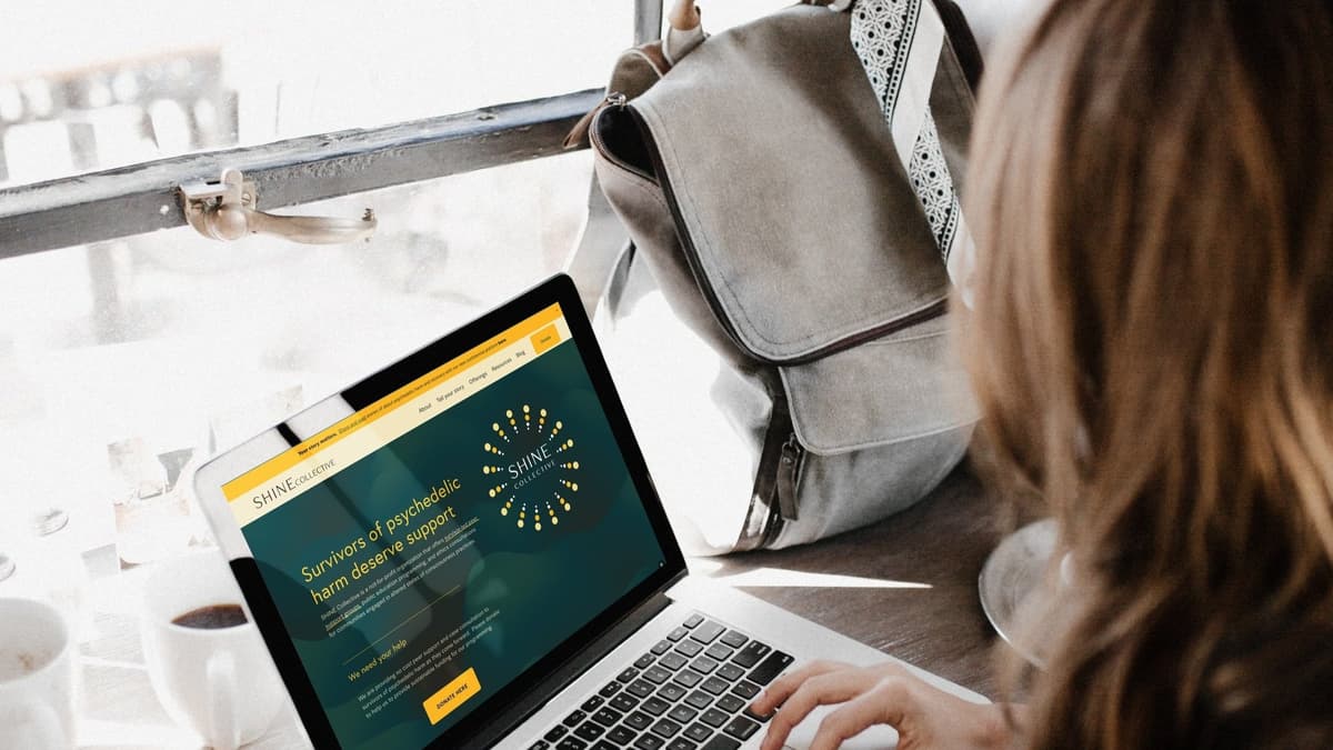 SHINE Collective website mockup