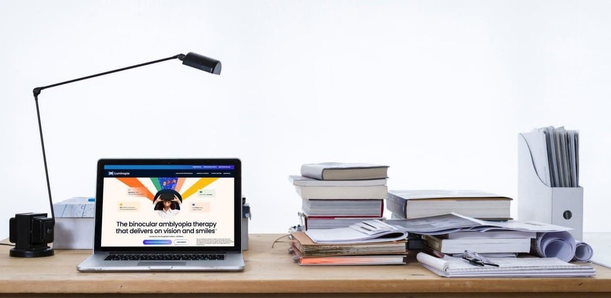 Luminopia homepage mockup showing binocular amblyopia therapy for children